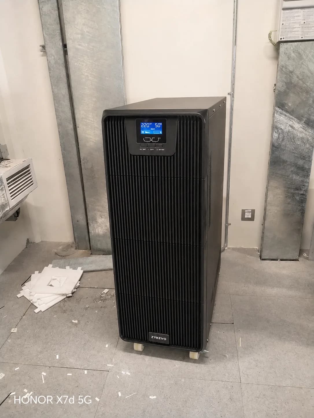 TITAN 40kVA UPS cabinet shown in an installed room reference image